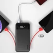 Kép 2/6 - Dudao 2x USB power bank 10000mAh 2A beépített kábel 3in1 Lightning / USB Type C / micro USB 3A fehér (K1A-white)